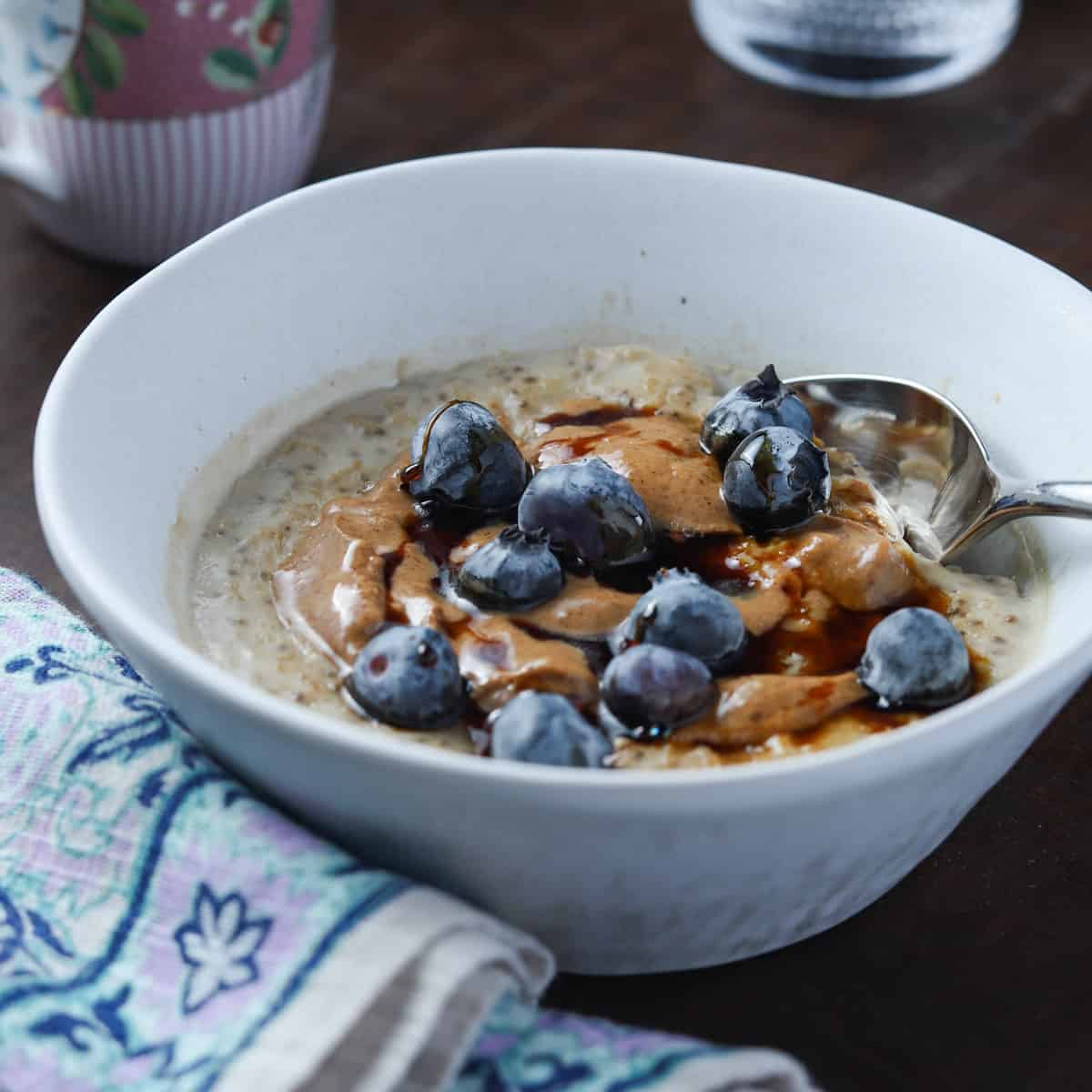 Vegan Oat and Chia Seed Porridge with Blueberries and Almond Butter